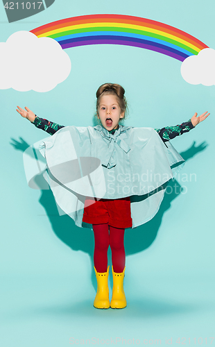 Image of Little girl posing in fashion style wearing autumn clothing.