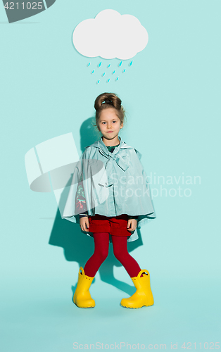 Image of Little girl posing in fashion style wearing autumn clothing.