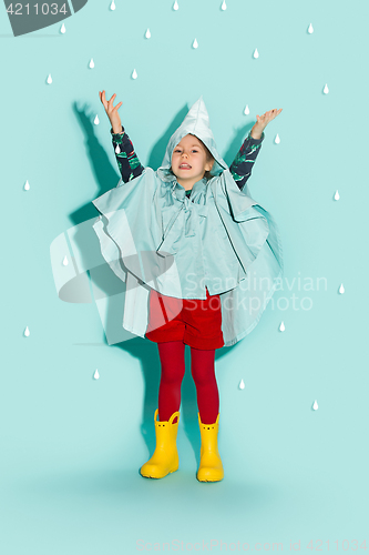 Image of Little girl posing in fashion style wearing autumn clothing.