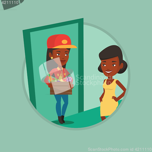 Image of Delivery courier delivering groceries to customer.