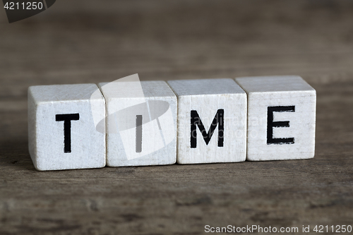 Image of Time, written in cubes