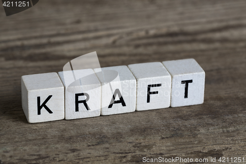 Image of German word power, written in cubes