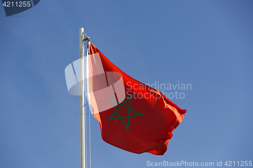 Image of National flag of Morocco on a flagpole