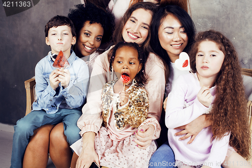 Image of Lifestyle and people concept: young pretty diversity nations woman with different age children celebrating on birth day party together happy smiling, making selfie. African-american, asian and caucasi