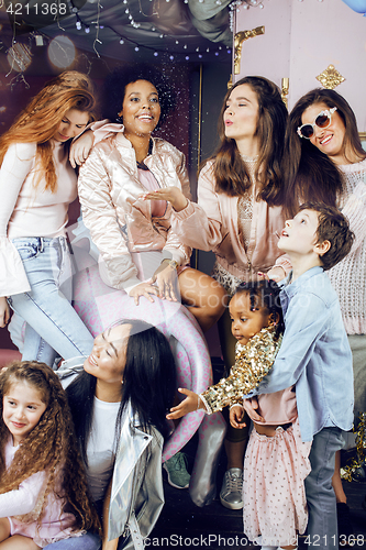 Image of Lifestyle and people concept: young pretty diversity nations woman with different age children celebrating on birth day party together happy smiling, making selfie. African-american, asian and caucasi