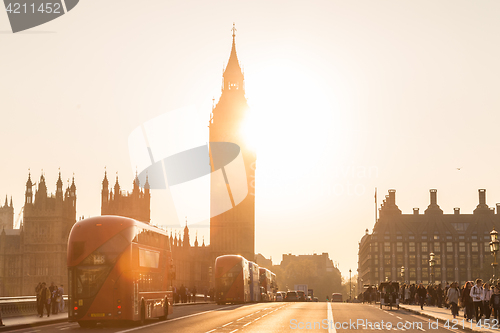 Image of Traffic and random people on Westminster Bridge in sunset, London, UK.