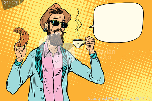 Image of Hipster with coffee and croissant