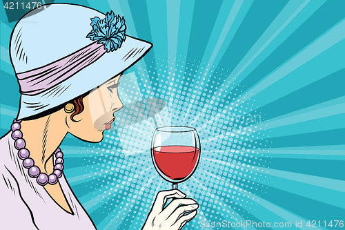 Image of Retro lady with a glass of wine