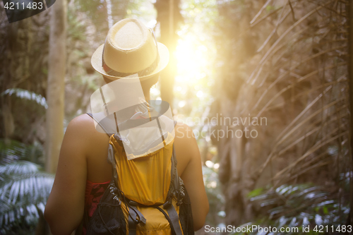 Image of Girl in hat with backpack