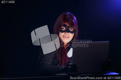 Image of Woman spy in black mask