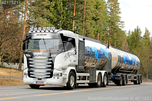 Image of Customized Scania Milk Tank Truck on the Road