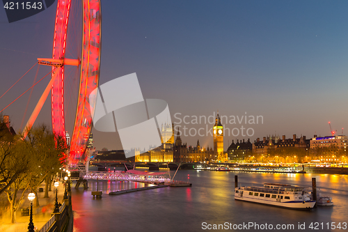 Image of London Eye, Big Ben and Houses of parliament in London, UK.