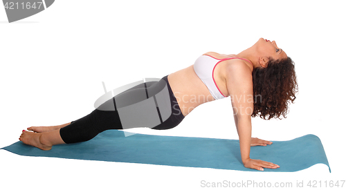 Image of Woman doing exercises.