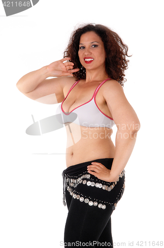 Image of Belly dancing young woman.