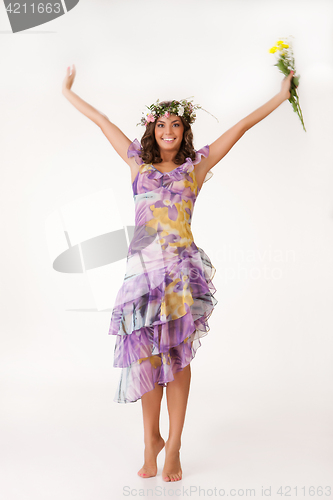 Image of Young Woman With Flower Garland