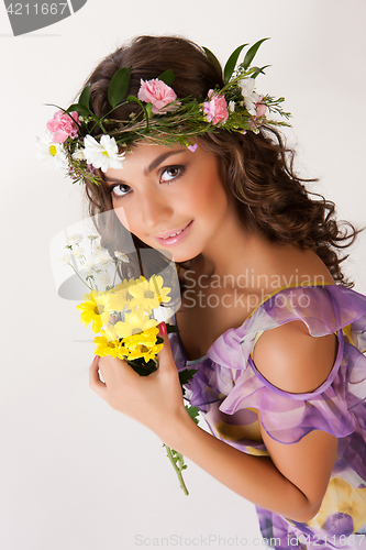 Image of Young Woman With Flower Garland