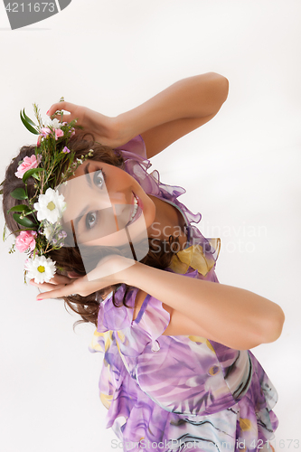 Image of Young Woman With Flower Garland