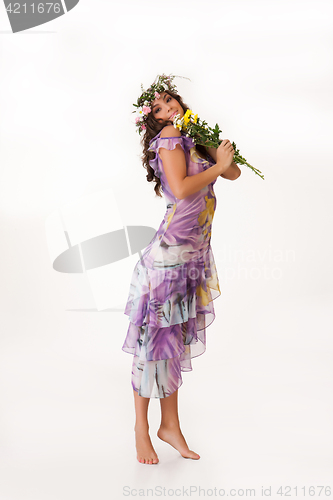 Image of Young Woman With Flower Garland
