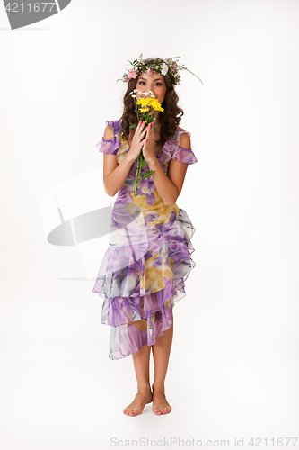 Image of Young Woman With Flower Garland