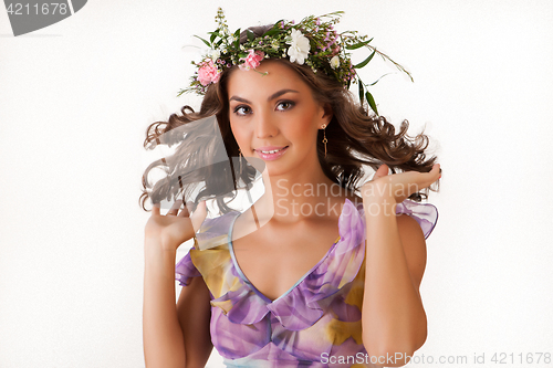 Image of Young Woman With Flower Garland
