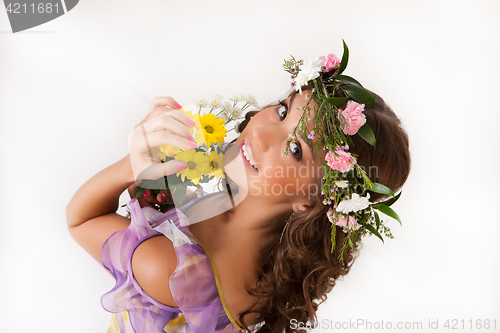 Image of Young Woman With Flower Garland