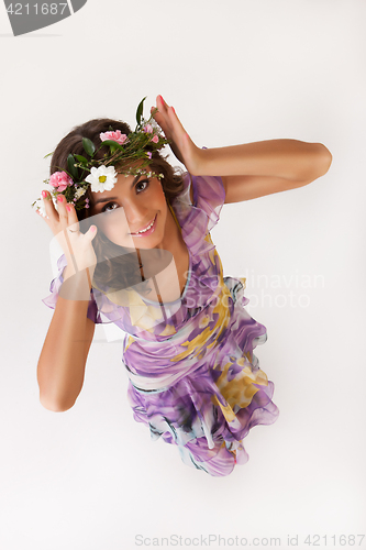 Image of Young Woman With Flower Garland