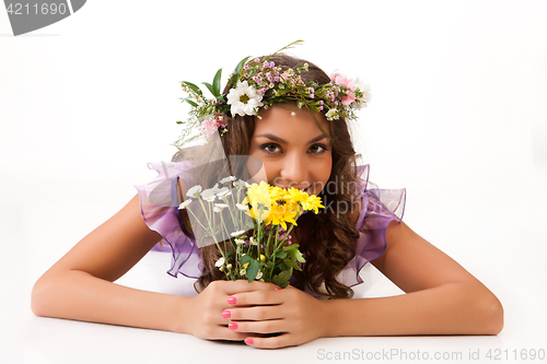 Image of Young Woman With Flower Garland