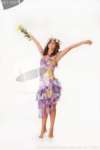 Image of Young Woman With Flower Garland