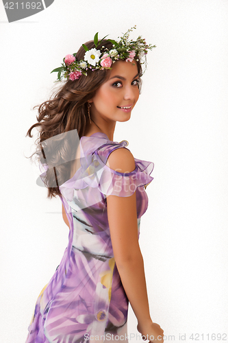 Image of Young Woman With Flower Garland