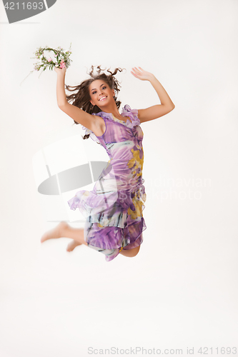 Image of Young Woman With Flower Garland