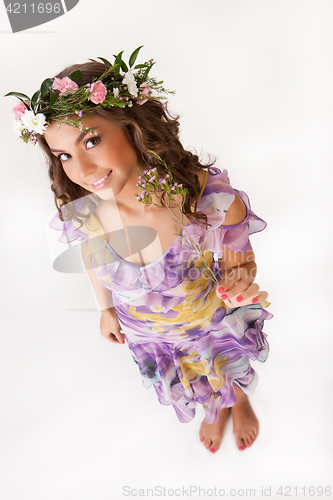 Image of Young Woman With Flower Garland