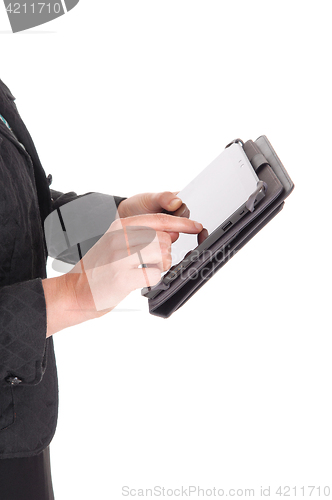 Image of Woman looking at her tablet.