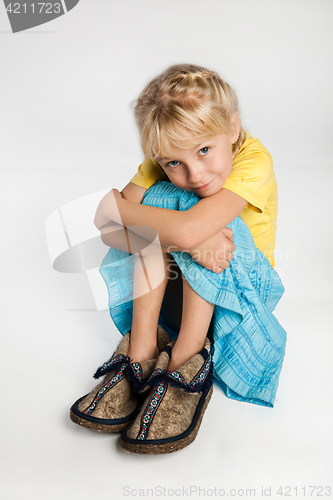 Image of Pretty Little Girl In Big Shoes