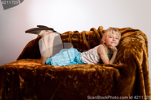 Image of Little Girla And Big Shoes