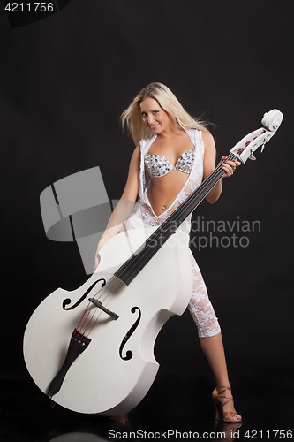 Image of Young Woman Playing On a Double Bass