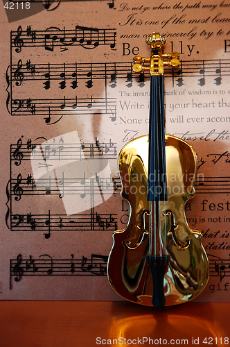 Image of Golden Violin and Music