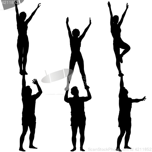 Image of Set Black silhouette two acrobats show stand on hand. illustration