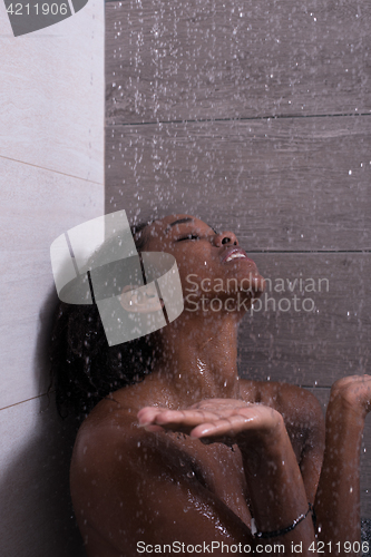 Image of African American woman in the shower