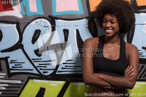 Image of black woman after a workout at the gym