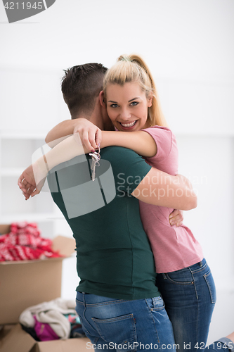 Image of happy Young couple moving in new house