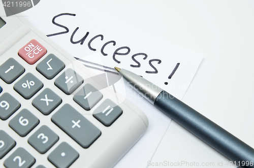 Image of Hand written success word on paper