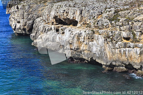 Image of Rocky Coast Extending into the Sea