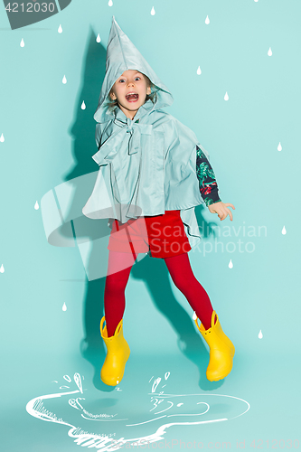 Image of Little girl posing in fashion style wearing autumn clothing.