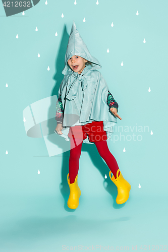 Image of Little girl posing in fashion style wearing autumn clothing.