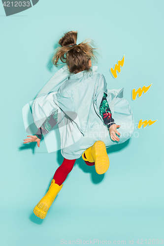 Image of Little girl posing in fashion style wearing autumn clothing.