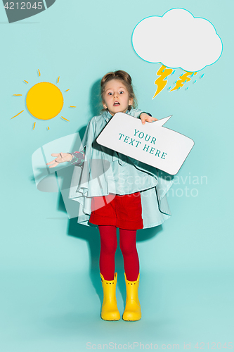 Image of Little girl posing in fashion style wearing autumn clothing.