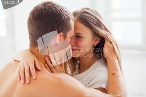 Image of Lifestyle. Beautiful couple in bed