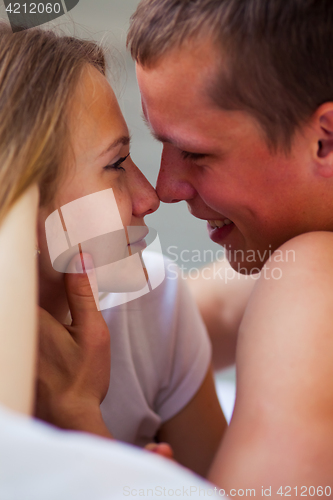 Image of Lifestyle. Beautiful couple in bed