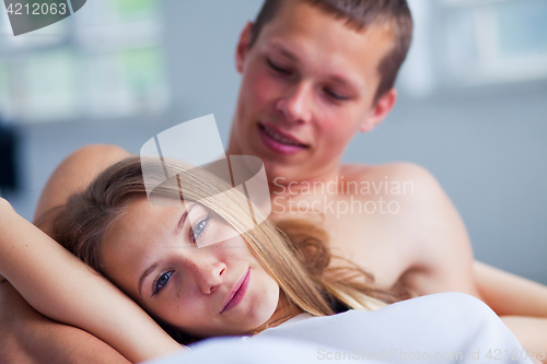 Image of Lifestyle. Beautiful couple in bed