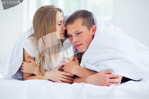 Image of Lifestyle. Beautiful couple in bed